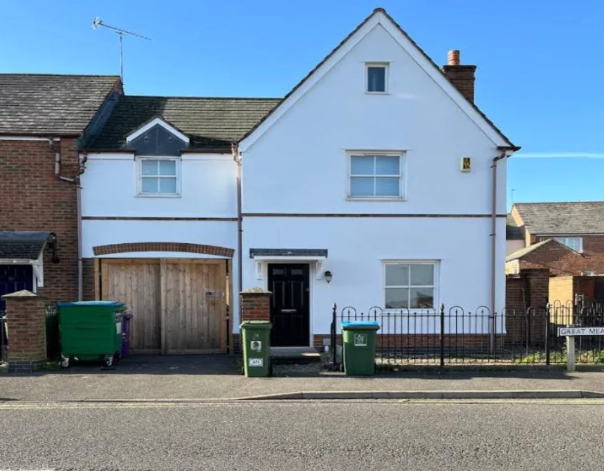 White render townhouse exterior repaint