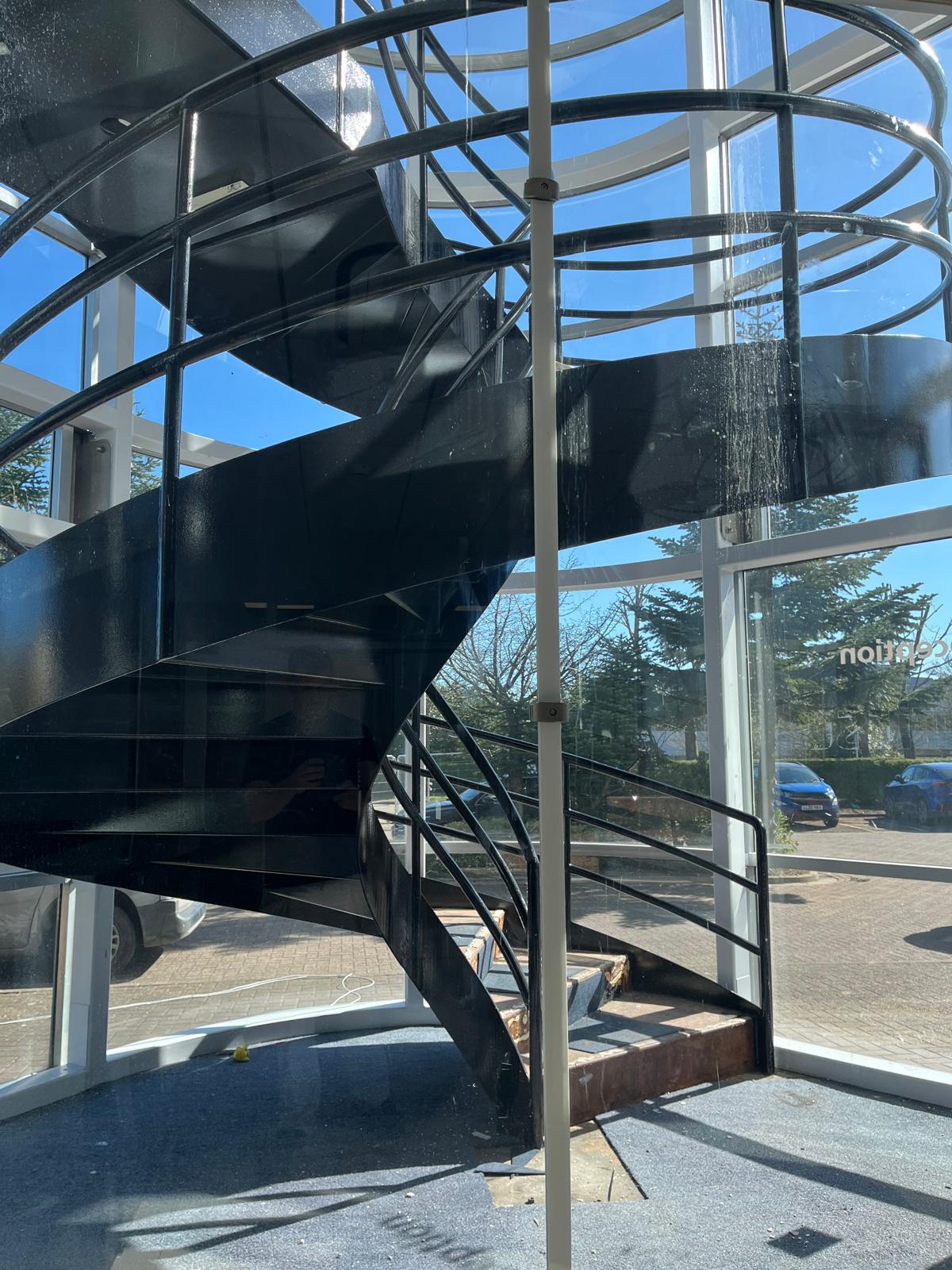 Refinished commercial spiral staircase