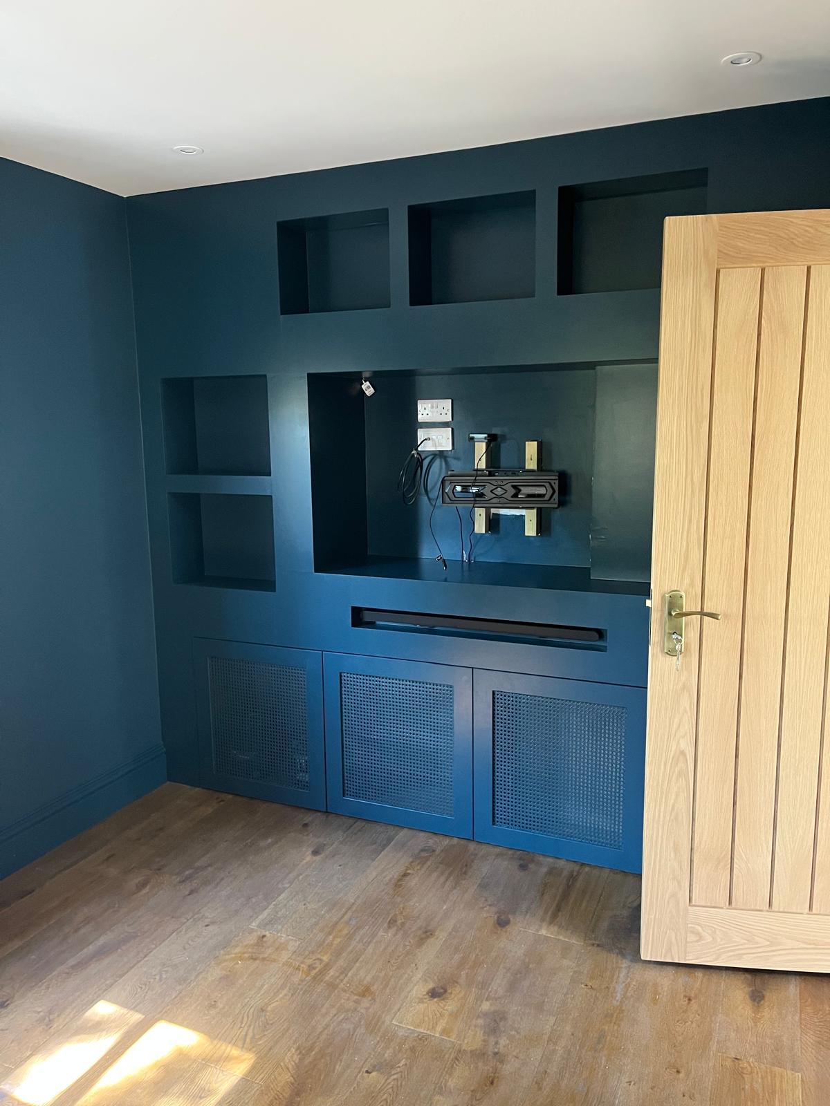 Bespoke navy media wall & alcove joinery